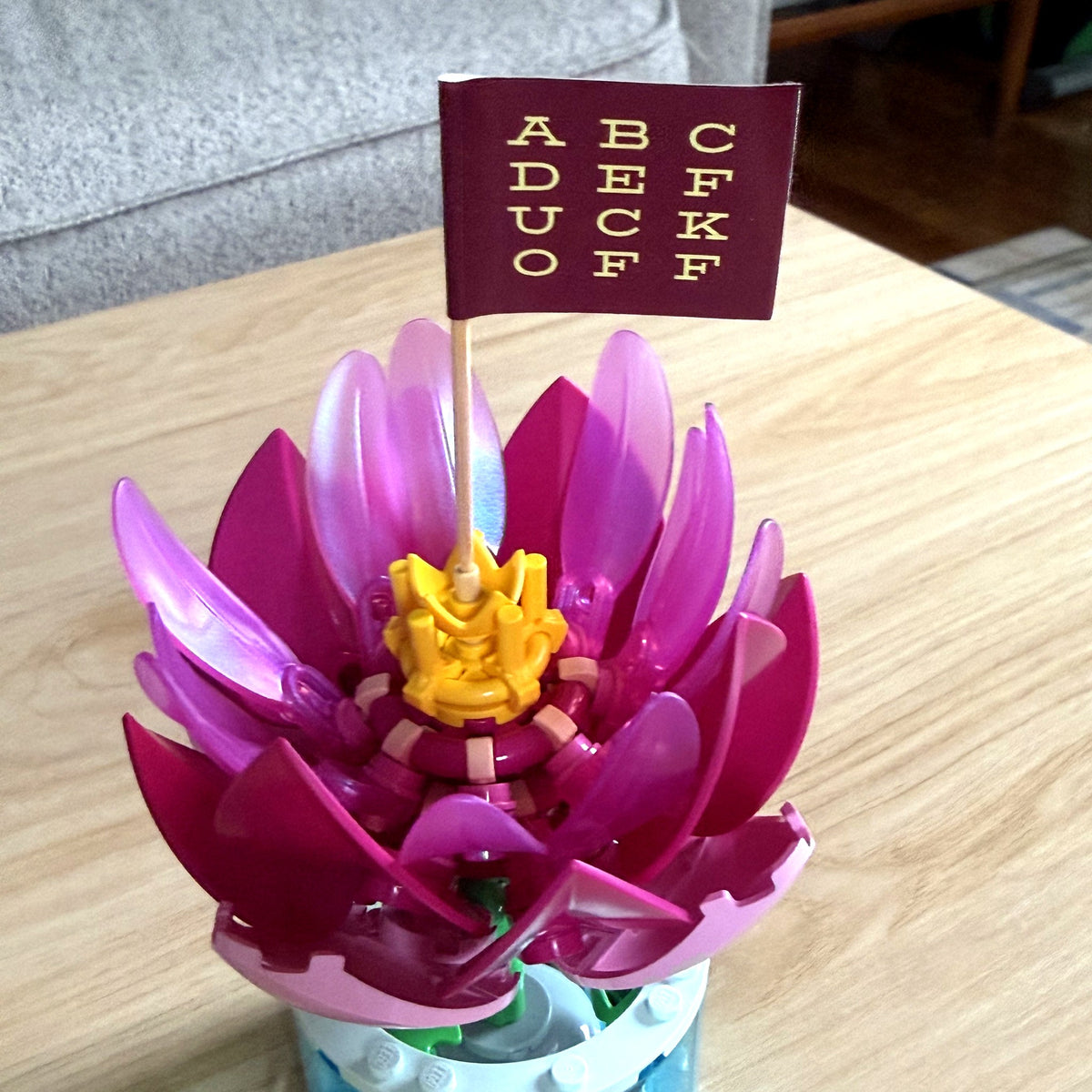 ABCDEFUCKOFF toothpick flag in a flower cupcake topper